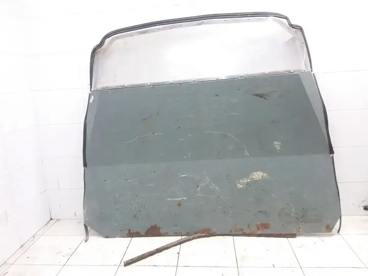 Volkswagen Transporter-Caravelle (2003 - 2009)   Панель багажника