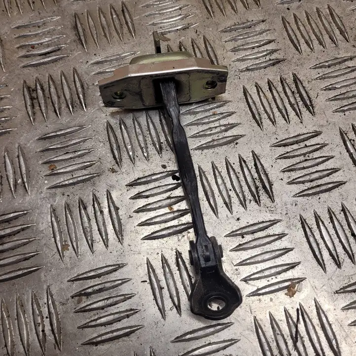 Toyota Yaris (2005 - 2009) Ограничитель двери передней — фото 1