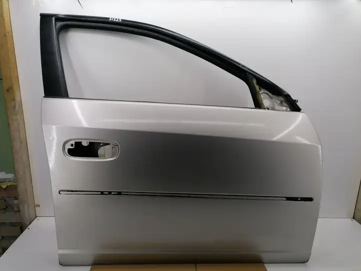 Cadillac CTS (2002 - 2007) Дверь — фото 1
