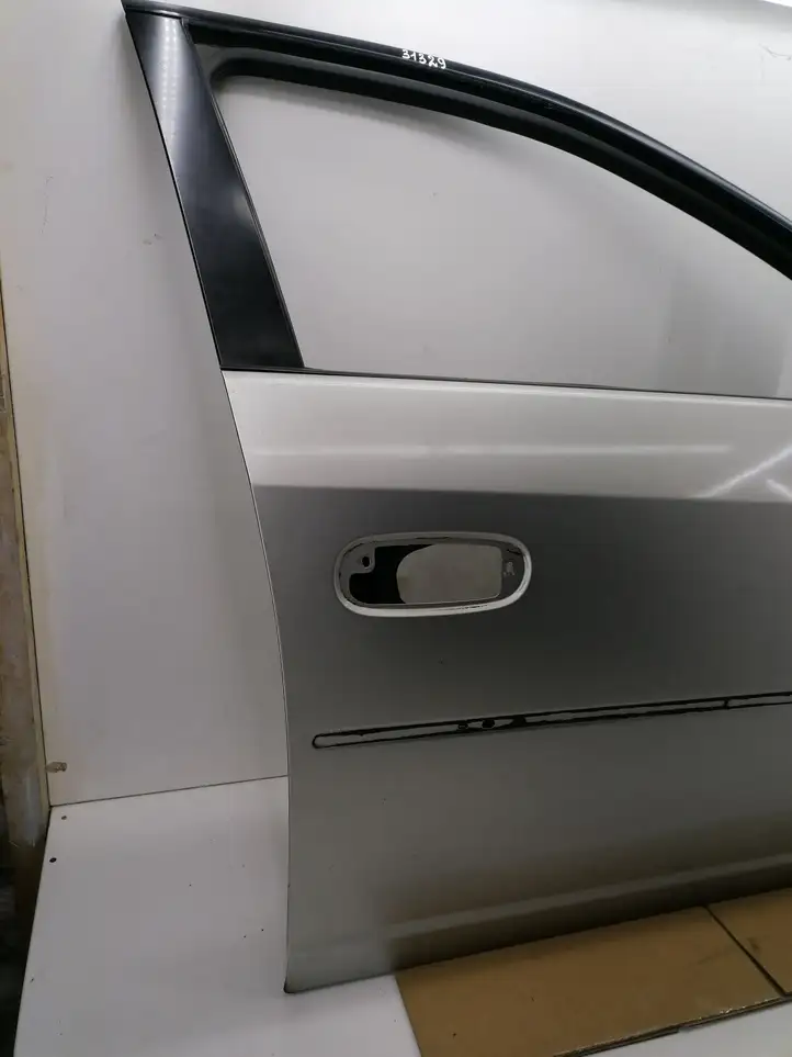 Cadillac CTS (2002 - 2007) Дверь — фото 4