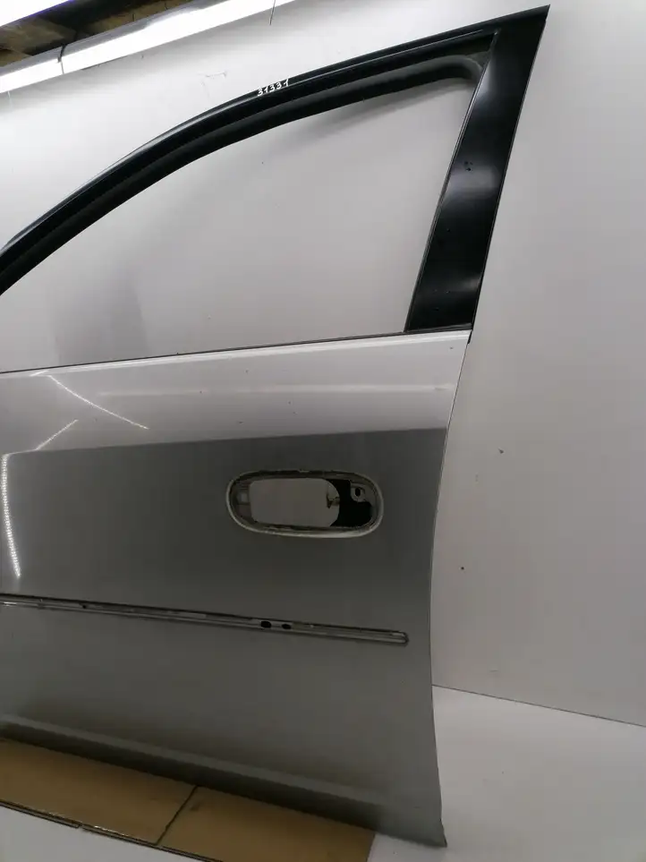 Cadillac CTS (2002 - 2007) Дверь — фото 3
