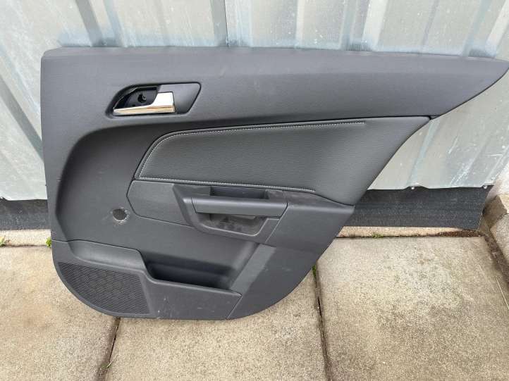 T110135 Opel Astra H Kita galinių durų apdailos detalė