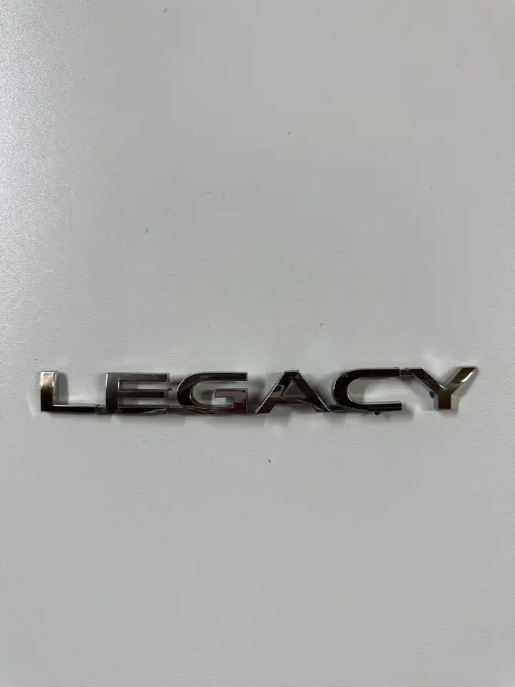 Subaru Legacy VII (2019 - ) Эмблема модели — фото 1