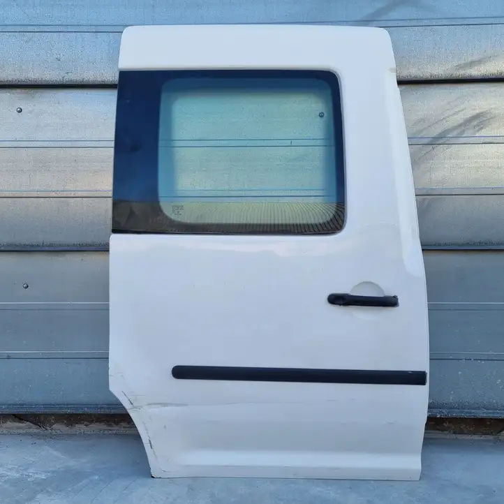 Volkswagen Caddy (2010 - 2015) Боковая раздвижная дверь — фото 1