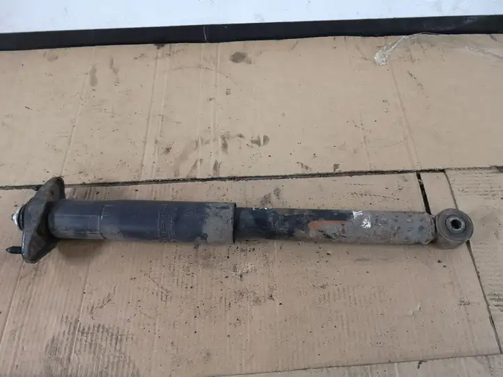 Mazda CX-7 (2006 - 2009)   Задний амортизатор с пружиной