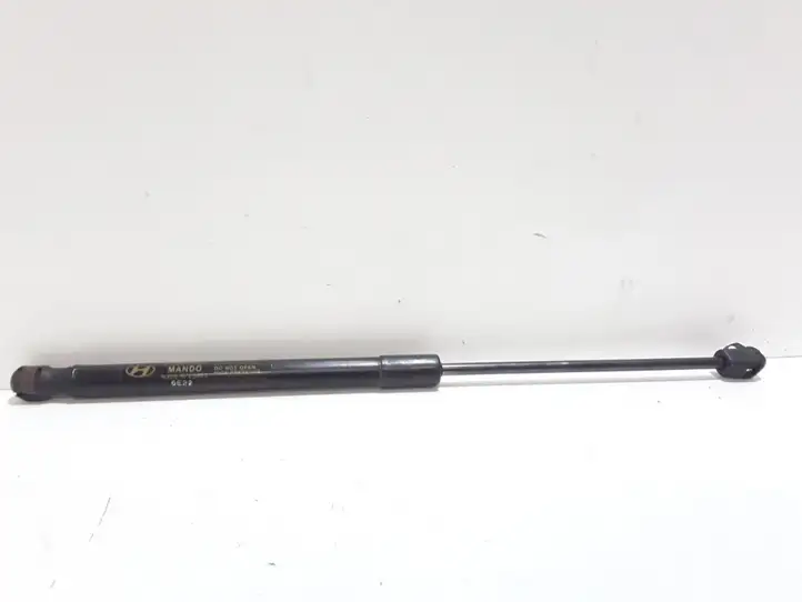 Hyundai Santa Fe (2005 - 2009)  811602B010  Амортизатор капота