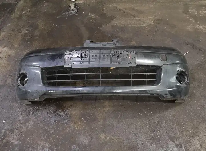 Nissan Note (E11) (2006 - 2014) Передний бампер — фото 2
