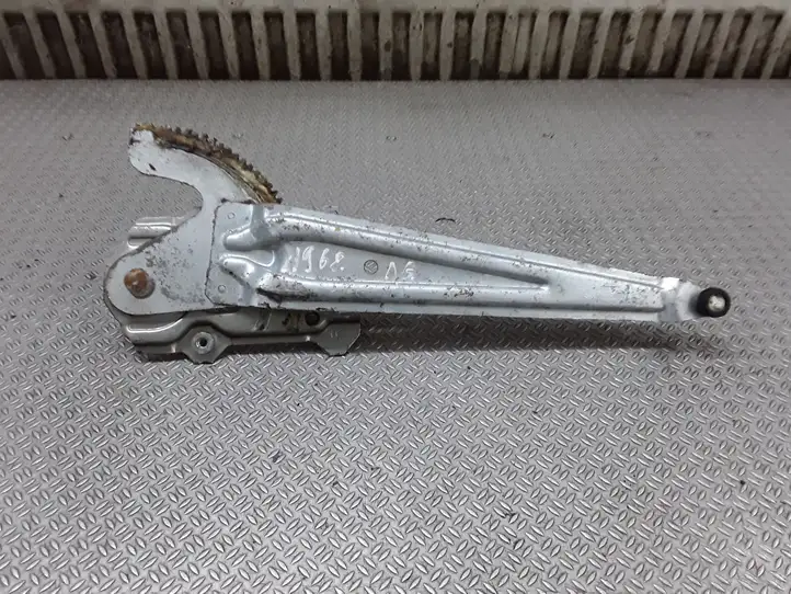 Toyota Yaris (2005 - 2009) Механический стеклоподъемник задней двери — фото 1