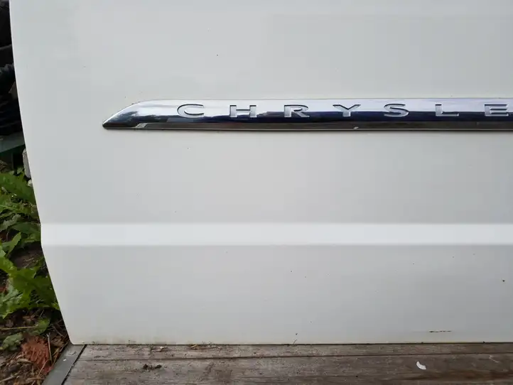 Chrysler Town and Country (2010 - 2016)   Дверь