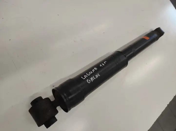 Renault Laguna (2001 - 2005)  562100001R Задний амортизатор с пружиной