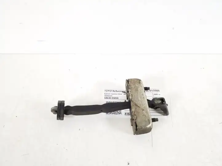Toyota Avensis T270 (2009 - 2012) 68630-05050 Ограничитель задней двери — фото 1