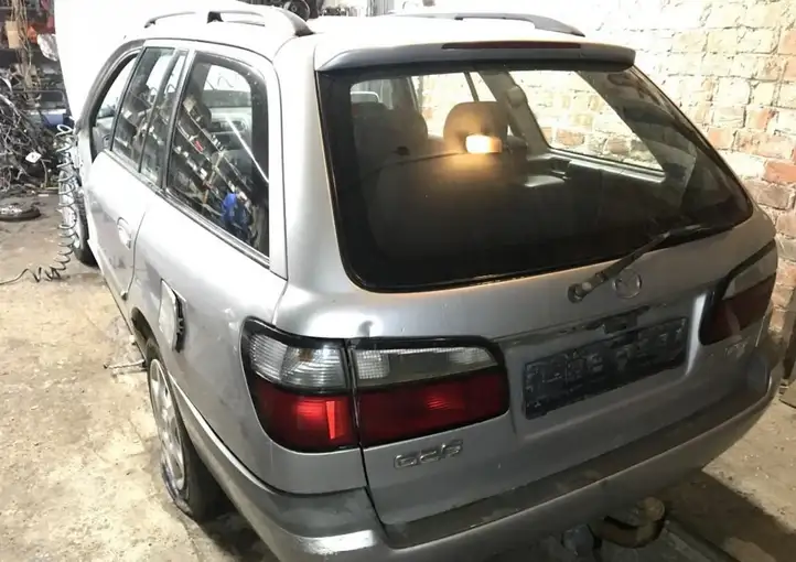 Toyota RAV 4 (XA30) (2006 - 2016) Ограничитель задней двери — фото 2