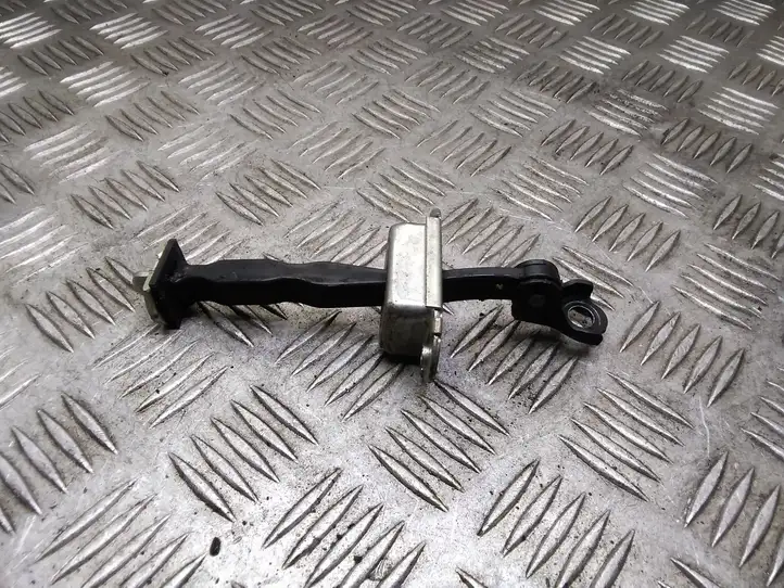 Nissan Qashqai (2010 - 2013) Ограничитель задней двери — фото 1