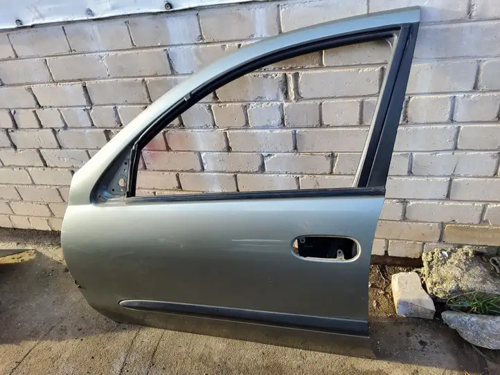 Nissan Almera N16 (2000 - 2010) Дверь — фото 1