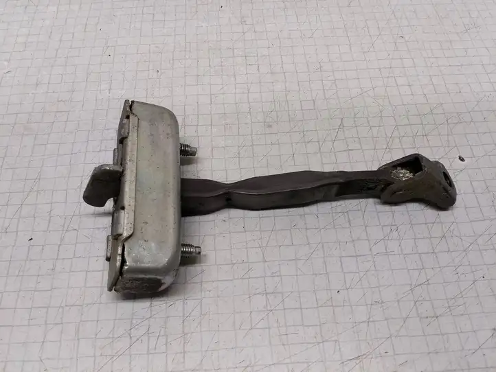Toyota Corolla E120 E130 (2004 - 2007) Ограничитель задней двери — фото 2