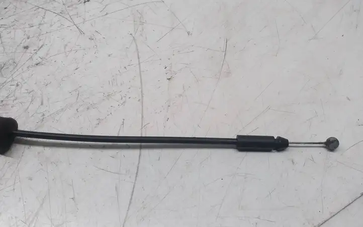 Subaru Outback (2009 - 2014) Трос замка передней двери — фото 2