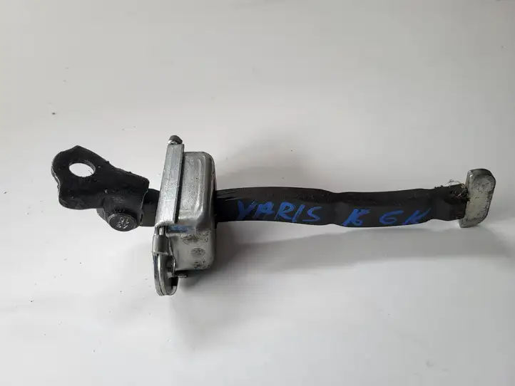 Toyota Yaris (2014 - 2019) Ограничитель задней двери — фото 1
