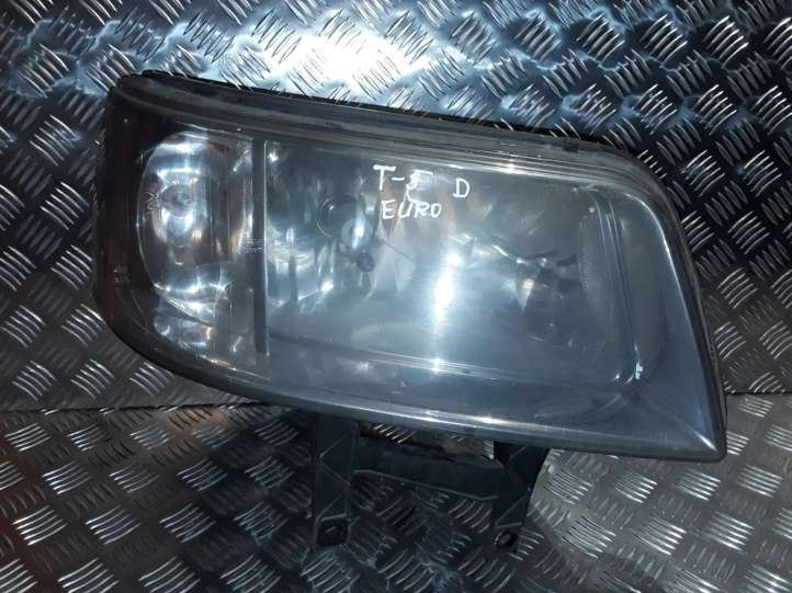 Volkswagen Transporter-Caravelle (2003 - 2009)  1305235738 Передняя фара