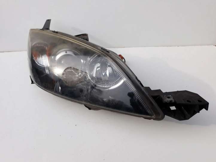 Mazda 3 (2006 - 2009)   Передняя фара
