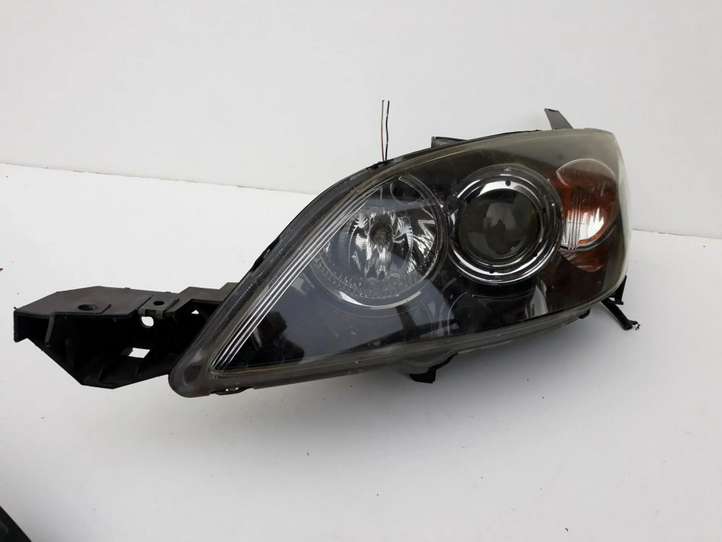 Mazda 3 (2006 - 2009)   Передняя фара