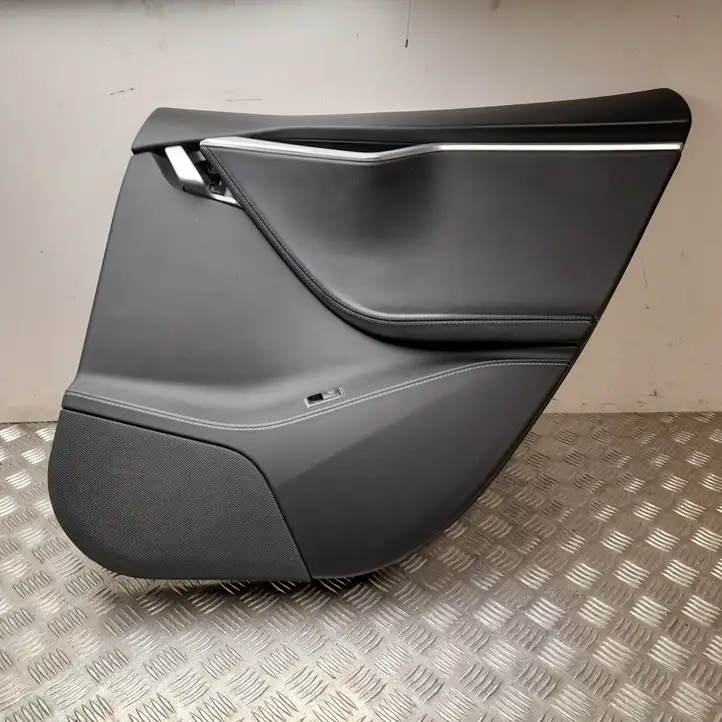 Tesla Model S (2016 - 2021) 100810514L Обшивка передней двери — фото 1
