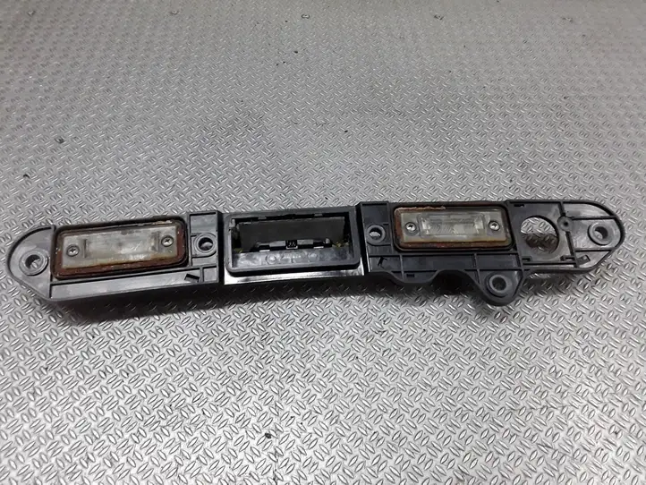 Volkswagen PASSAT B6 (2005 - 2010) 1T0827574L Подсветка номера — фото 1