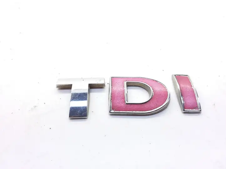 Volkswagen Touran I (2003 - 2010) Эмблема производителя — фото 1