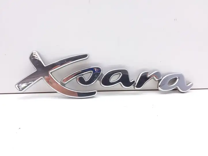 Citroen Xsara Picasso (1999 - 2012) Эмблема производителя — фото 1