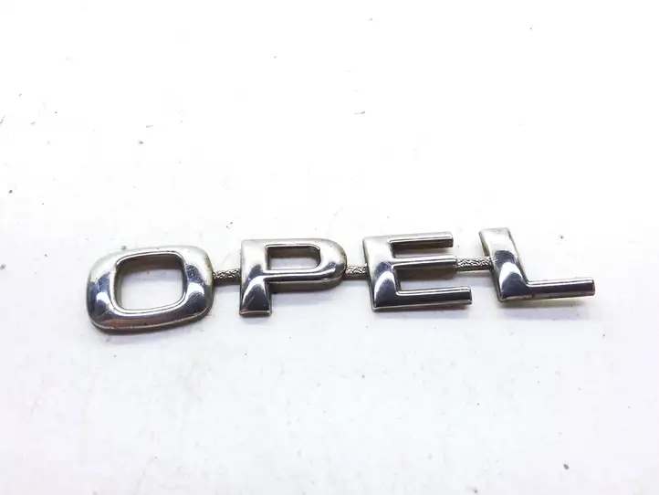 Opel Zafira A (1999 - 2003) Эмблема производителя — фото 1