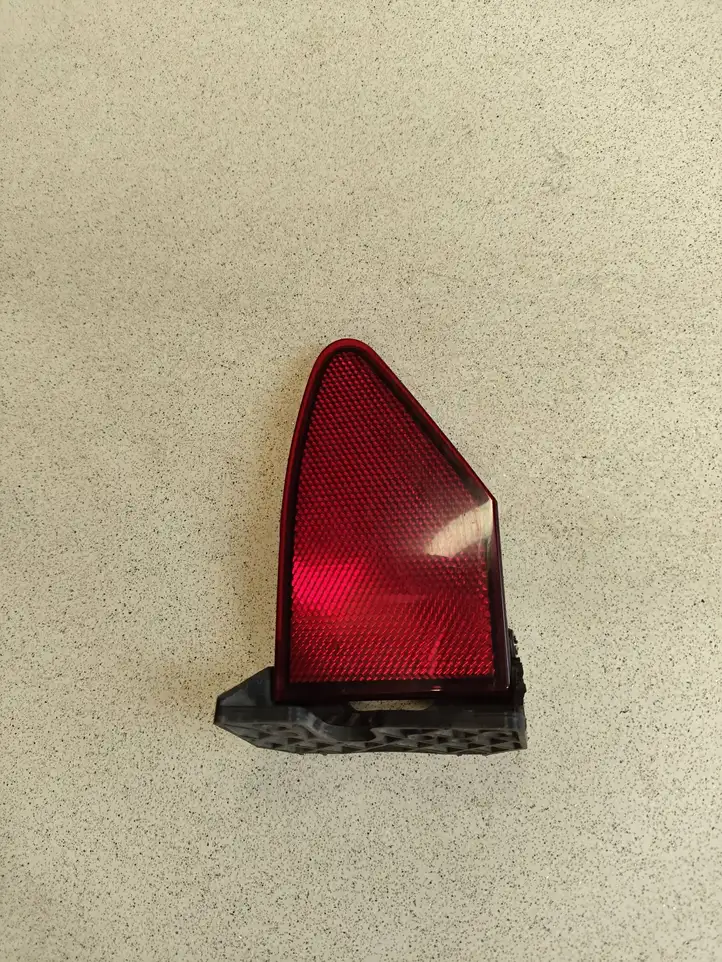 Tesla Model S (2012 - 2016) 1022423 Крышка зарядного разъема — фото 1