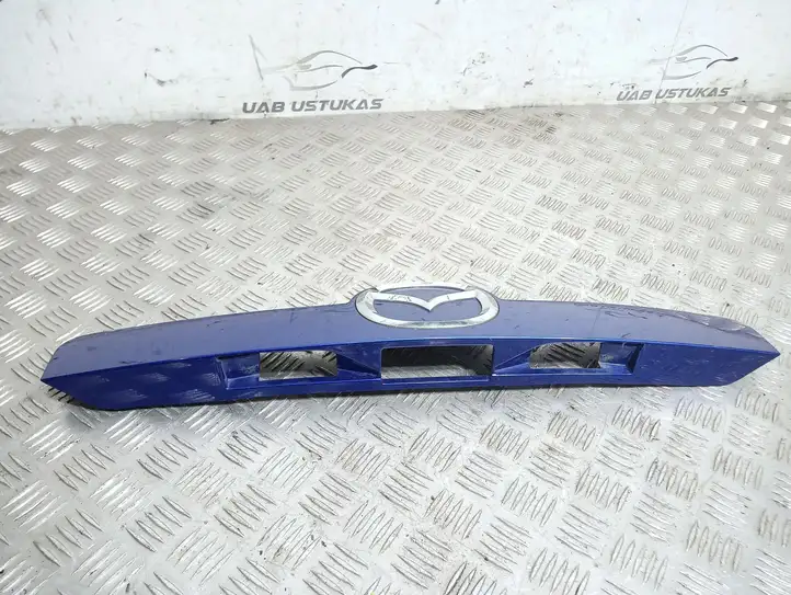 Mazda CX-7 (2006 - 2009) EG2150811 Подсветка номера — фото 2