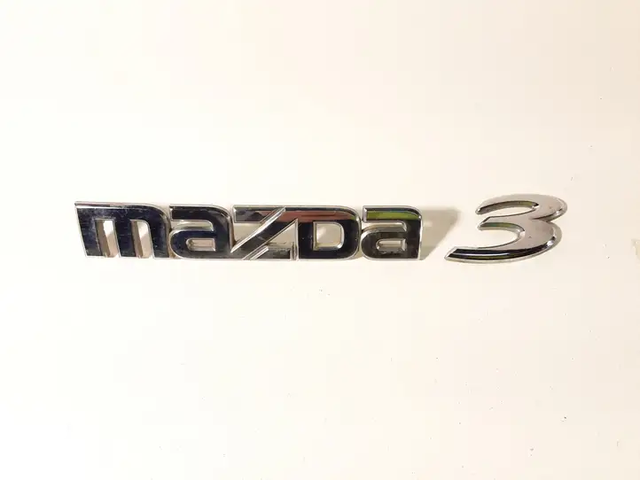 Mazda 3 I (2006 - 2009) BP4K51710 Эмблема производителя — фото 1