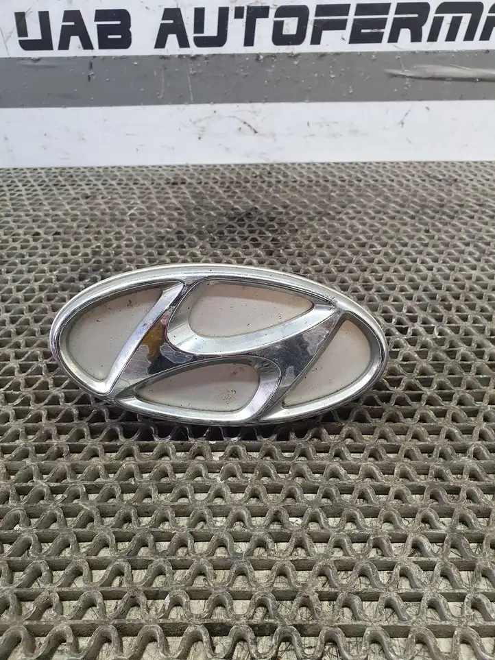 Hyundai i30 (2015 - 2017) 87311A6000 Эмблема производителя — фото 2