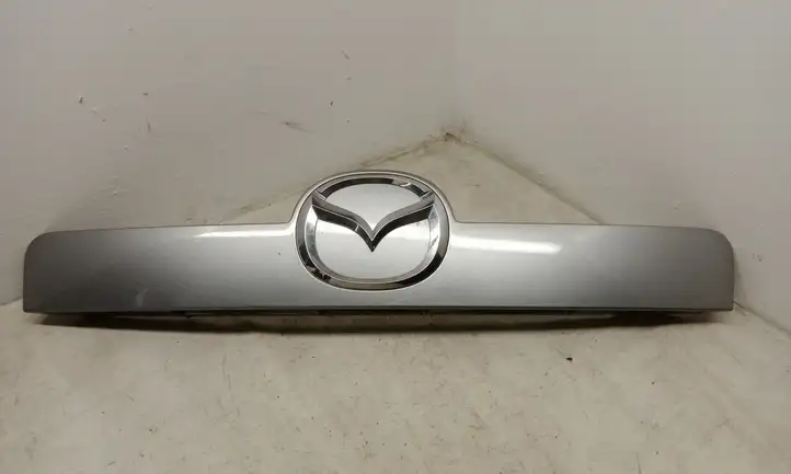 Mazda CX-7 (2009 - 2014) EG2150811 Подсветка номера — фото 1