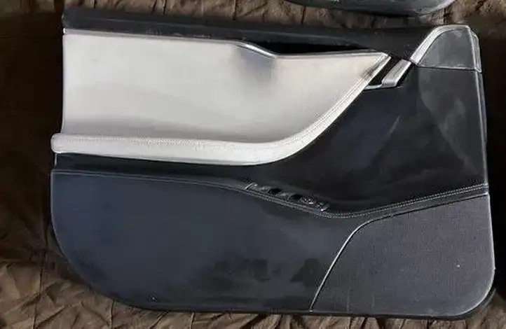 Tesla Model S (2016 - 2021) Обшивка передней двери — фото 1