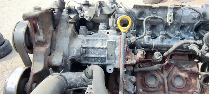 Toyota Corolla E120 E130 (2000 - 2004) 2210027010 Топливный насос — фото 1