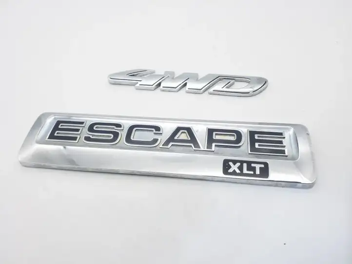 Ford Escape II (2007 - 2012) 8L847843156AA Эмблема производителя — фото 1