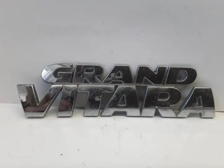 Suzuki Grand Vitara II (2005 - 2008) Эмблема производителя — фото 1