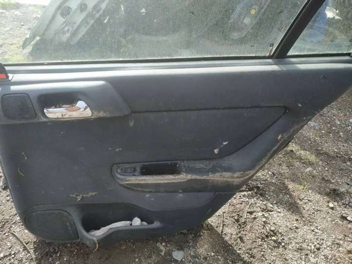 melynos Opel Astra G Galinės durys