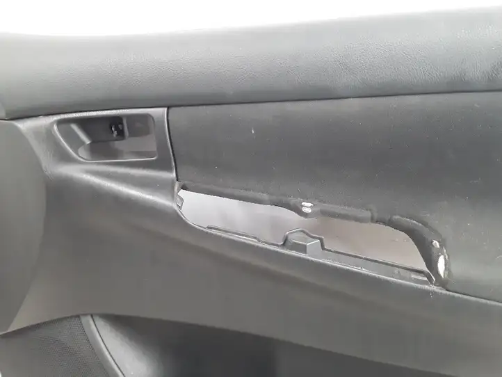 Toyota Corolla E120 E130 (2004 - 2007) 6776302050 Обшивка передней двери — фото 6