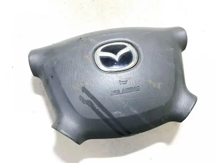 Mazda 323 F (2001 - 2003) b25f57k00 Подушка безопасности руля — фото 1