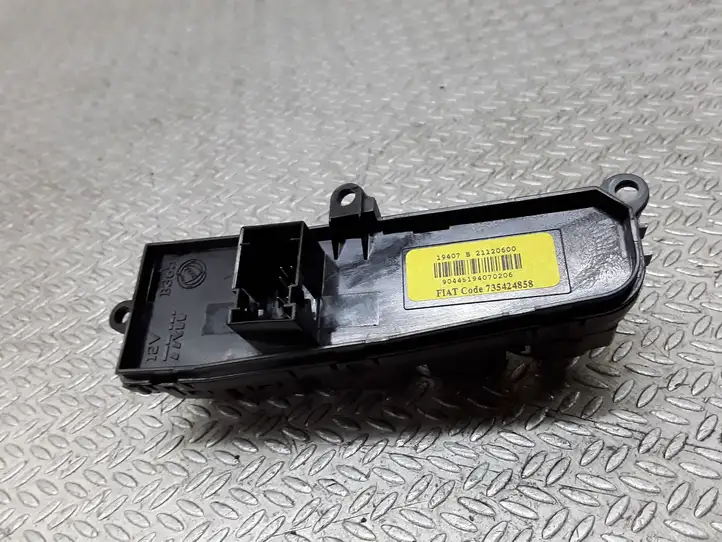 Fiat Bravo (2007 - 2014)  735424858 Включатель регулировки высоты фонарей
