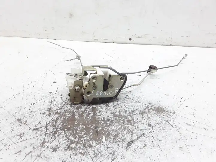 Mitsubishi L200 (1996 - 2006) Замок передней двери — фото 3
