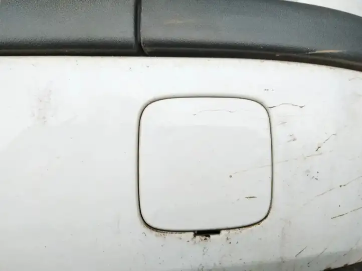 Ford Focus (2005 - 2008) Заглушка буксировочной петли бампера — фото 1